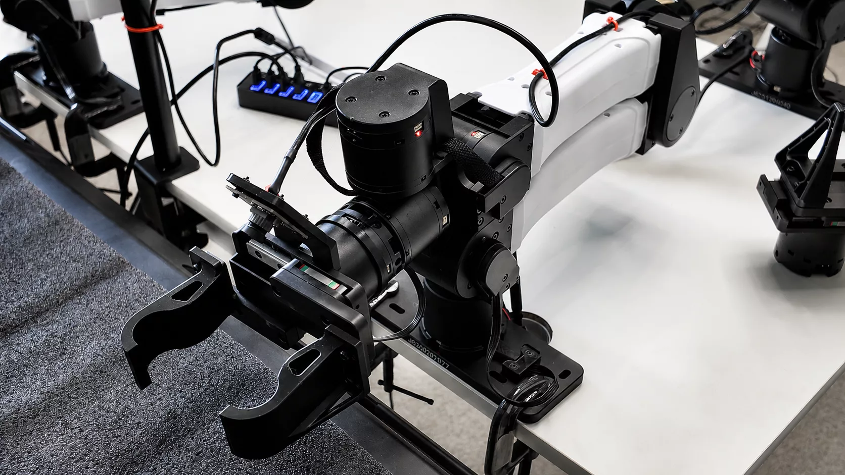 Custom gripper and mount built for the arm
